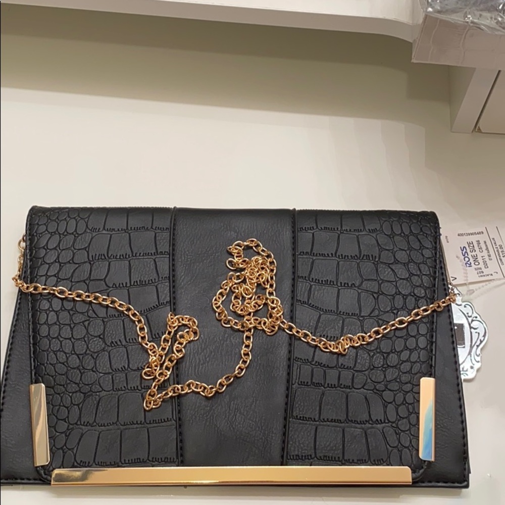 Black leather over the shoulder bag.